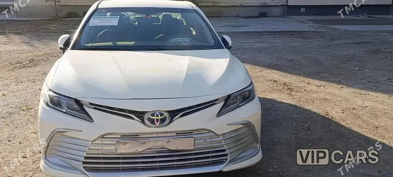 Toyota Camry Hybrid, 2022 — фото 1