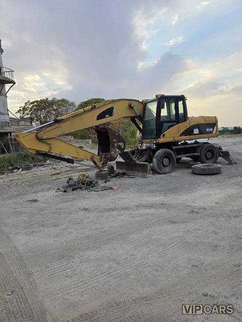 Caterpillar 320 Series, 2012